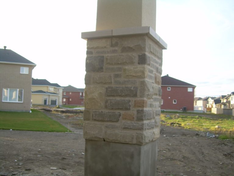 Large Stone and Parged Post Close Up