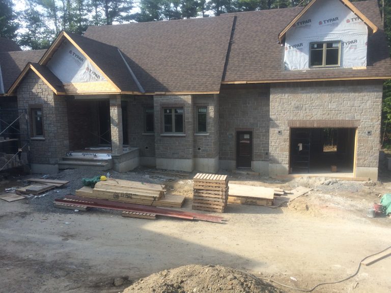 Nutral Color Stone Front on New Home