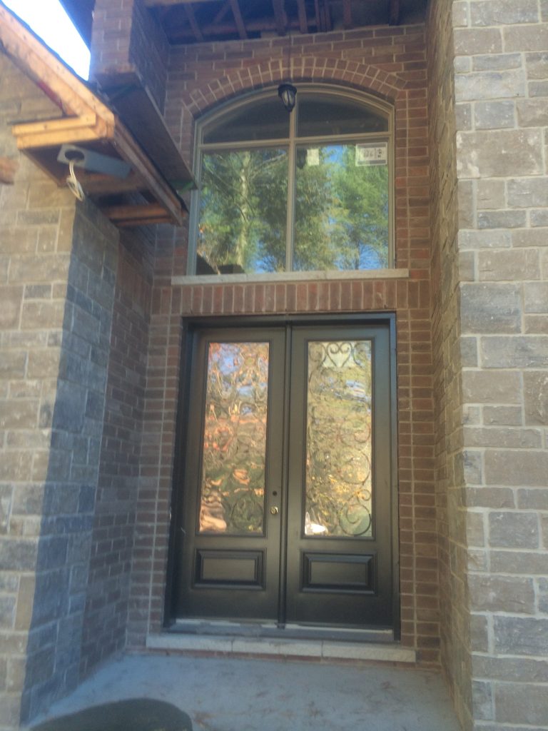 New Home Entranceway with Brick Arches and Rowlocks